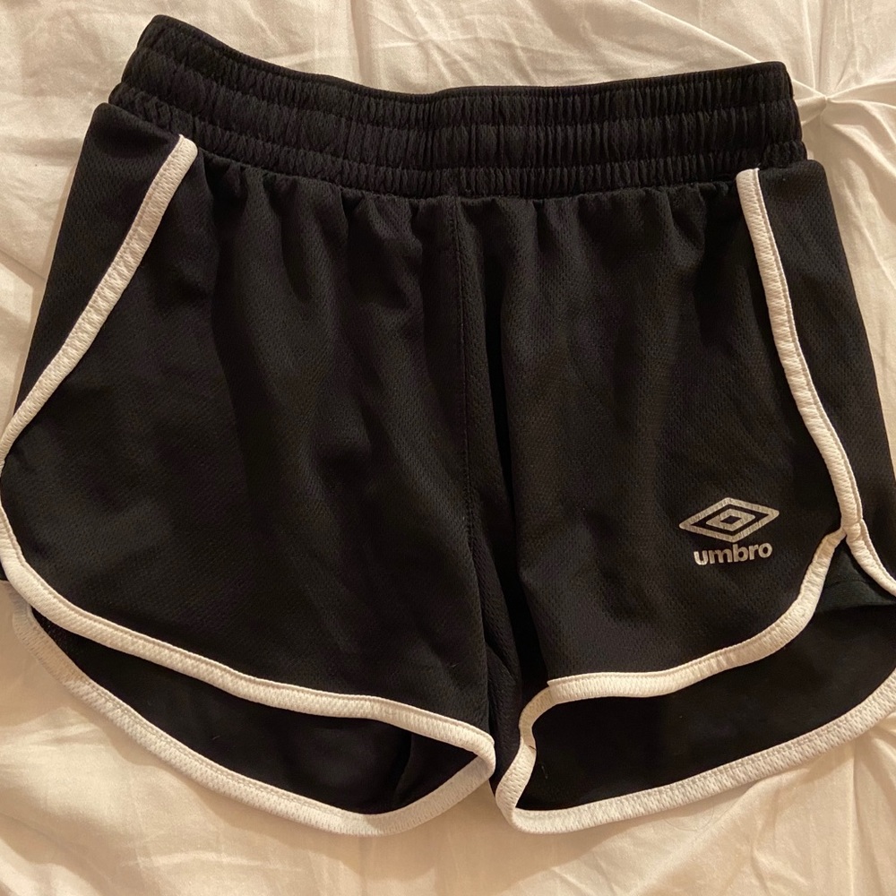 Umbro black and white striped workout shorts.